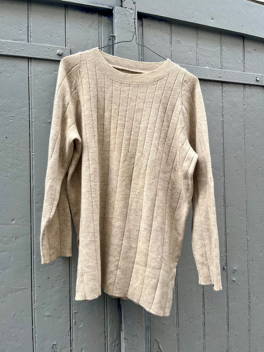 Le pull beige, taille 40